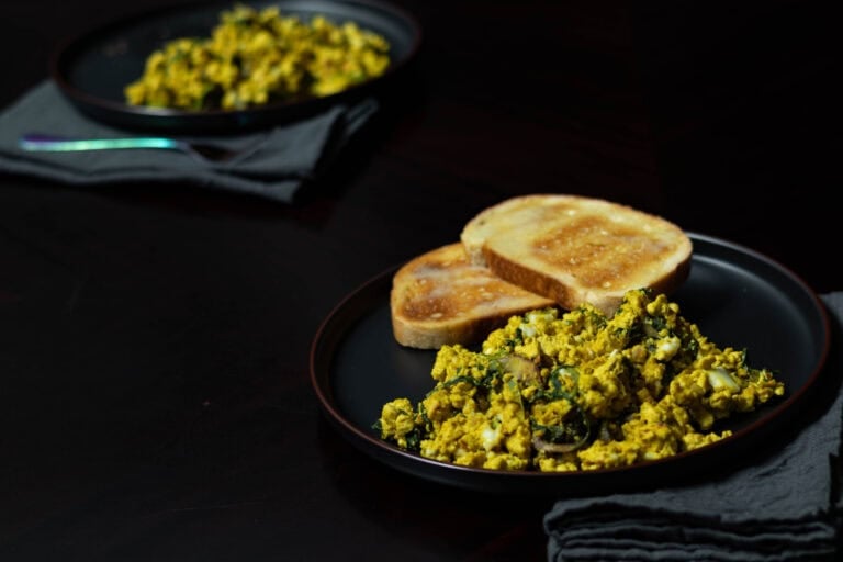 Tofu plates with tofu scramble and buttered toast.