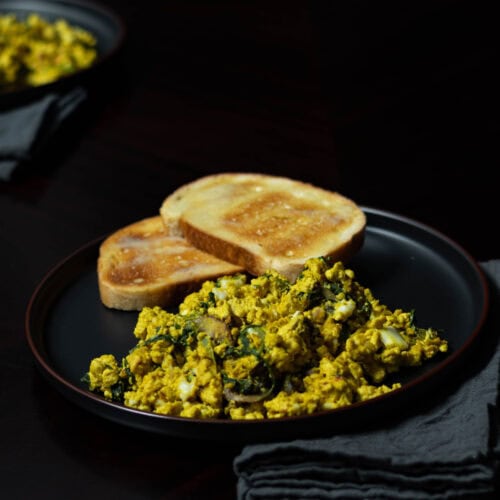 Tofu plates with tofu scramble and buttered toast.