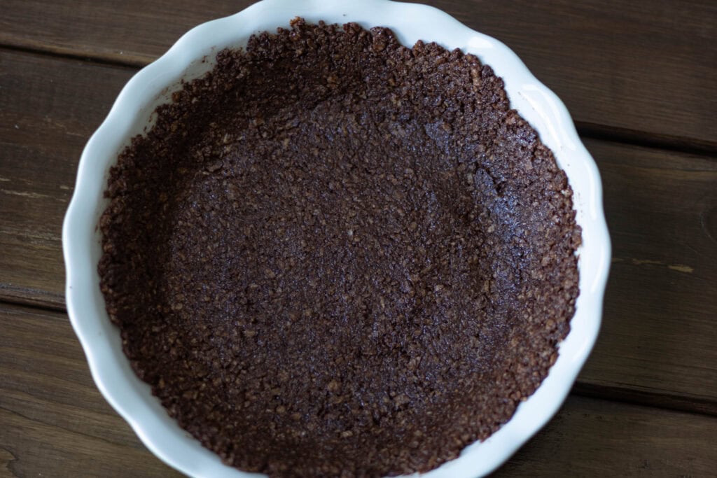 Pie pan with chocolate TVP crust.