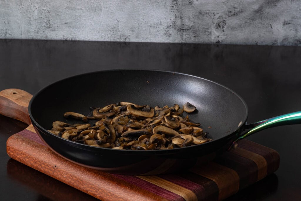 Pan of sauteed mushrooms and onions.