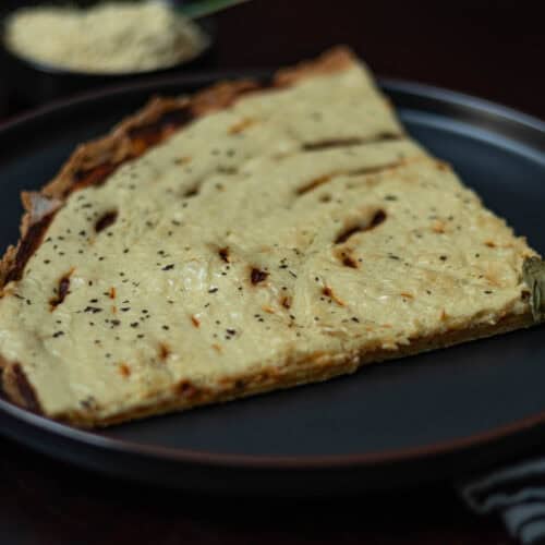 Slice of pizza with liquid mozzarella.
