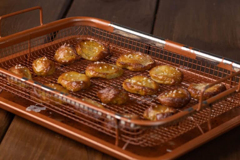 Pretzel bites on a copper crisping tray.