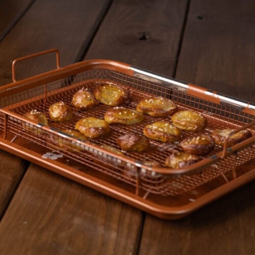 Pretzel bites on a copper crisping tray.