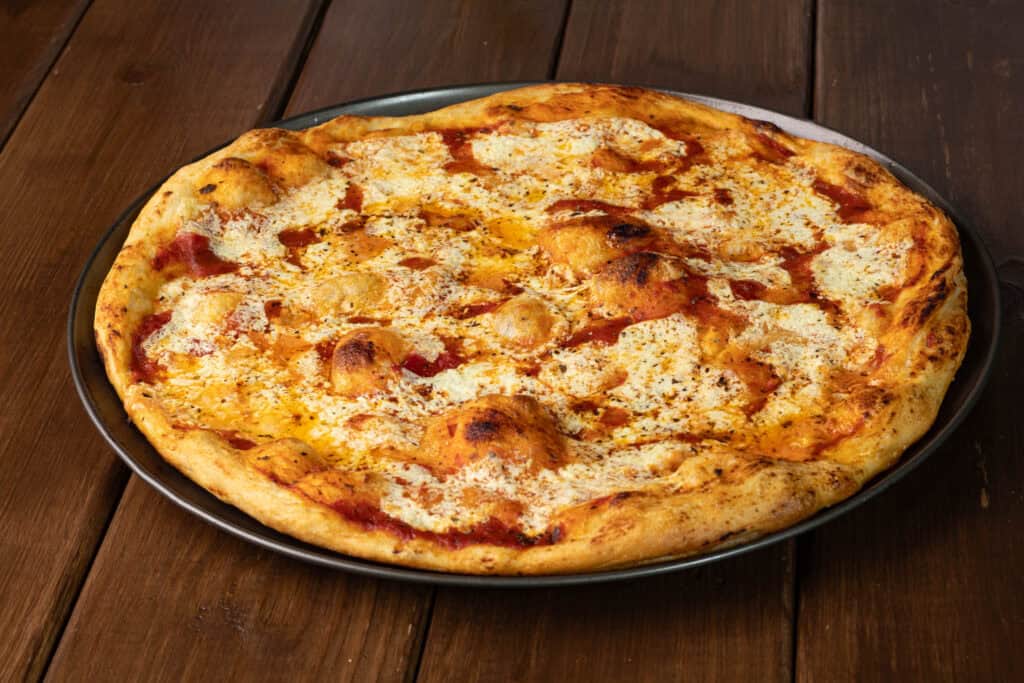 Large high protein vegan cheese pizza.