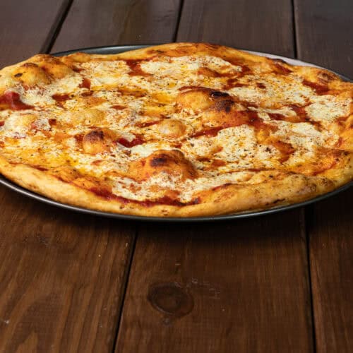 Large high protein vegan cheese pizza.
