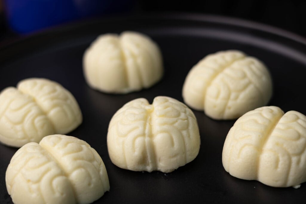 Fresh vegan mozzarella in brain shapes.