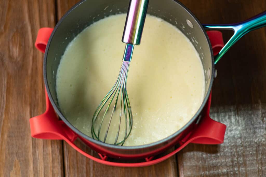 Melted fresh mozzarella mixture in a pot.