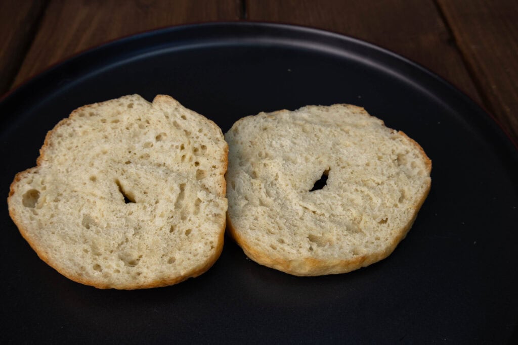 Bagel sliced in half.