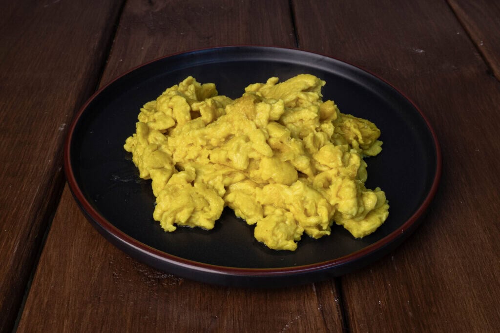 A plate with vegan scrambled eggs.