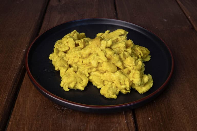 A plate with vegan scrambled eggs.