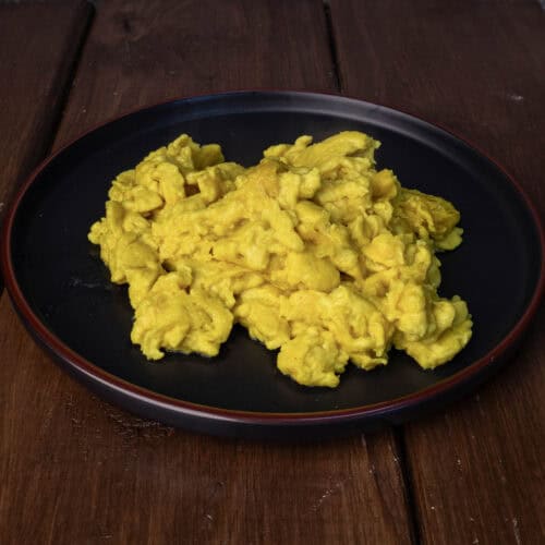 A plate of scrambled vegan eggs.