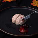 Brain made of strawberry flavored tofu with cherry filling.