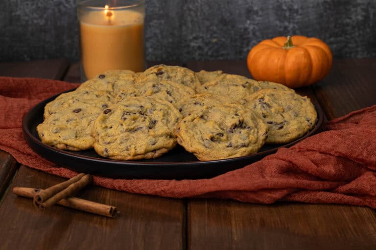 Pumpkin Chocolate Chip Cookies on a Fall decorated table.