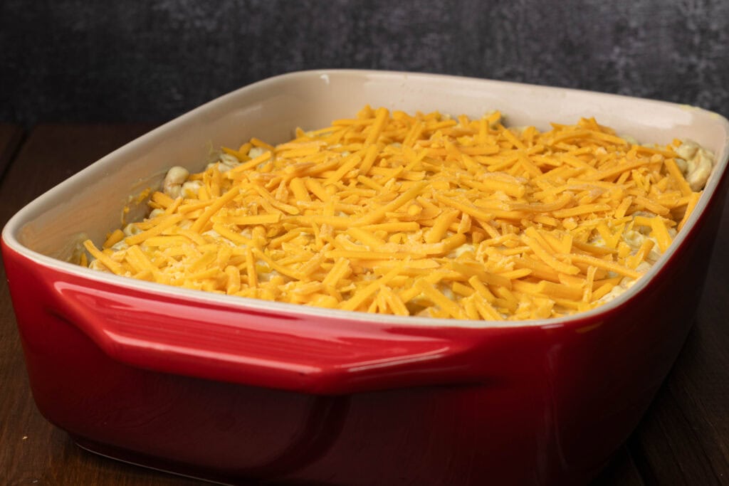 Vegan mac and cheese with shredded vegan cheese on top.