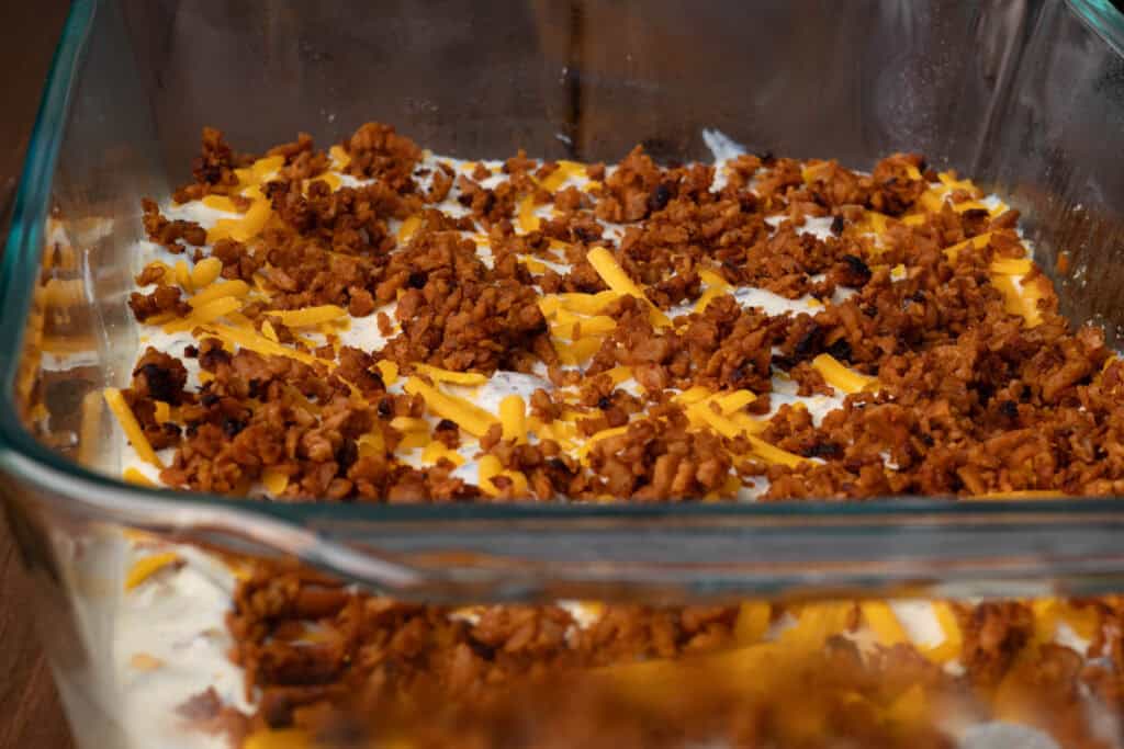 Bacon scalloped potatoes - the bacon layer.