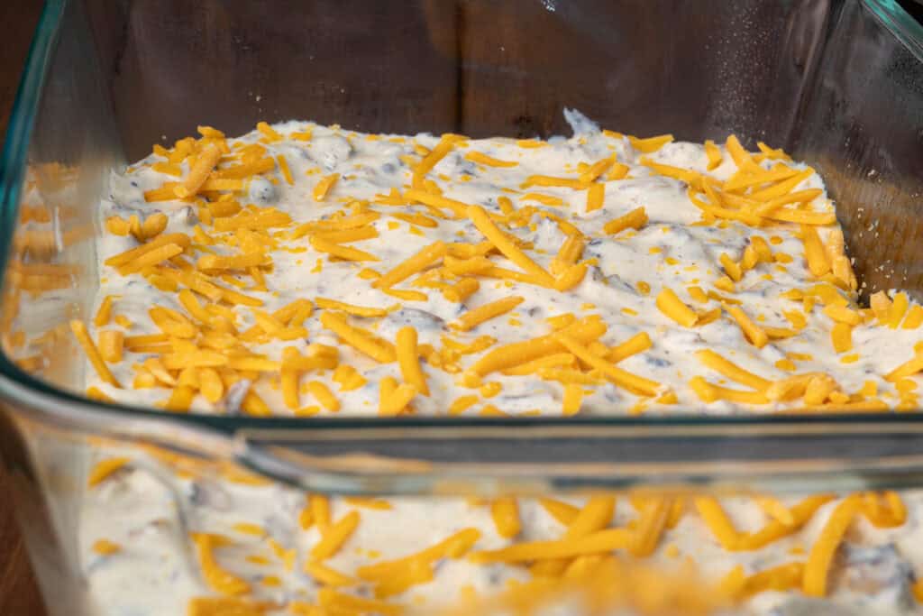 Bacon scalloped potatoes - the cheese layer.