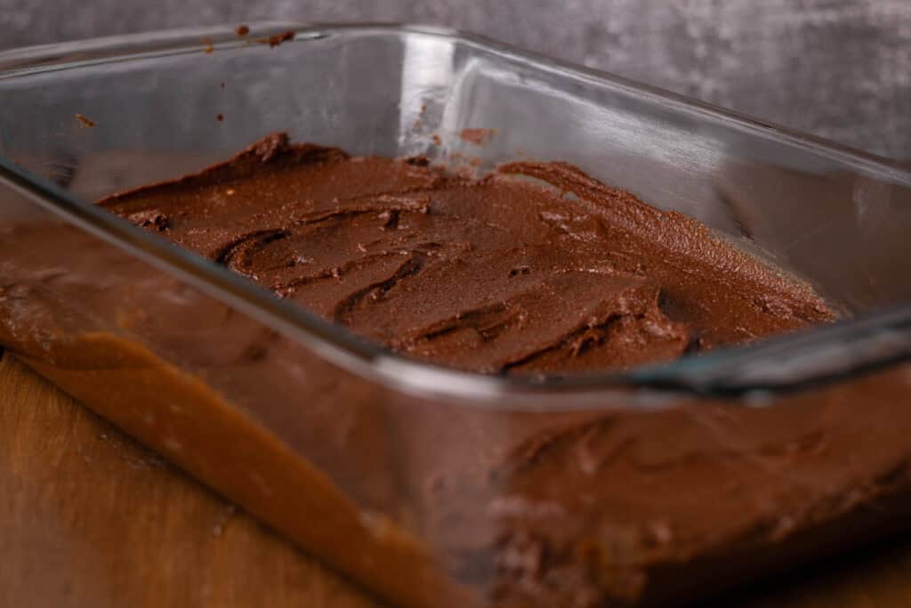 Brownie batter in a baking pan.