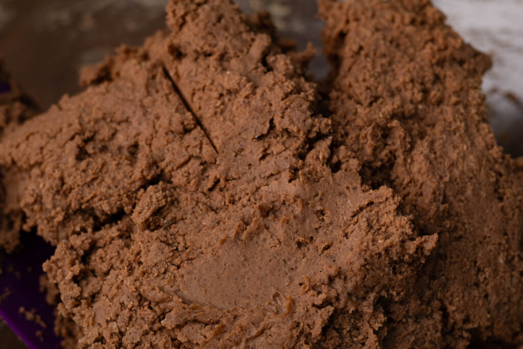 Chocolate protein cookie dough, close up.