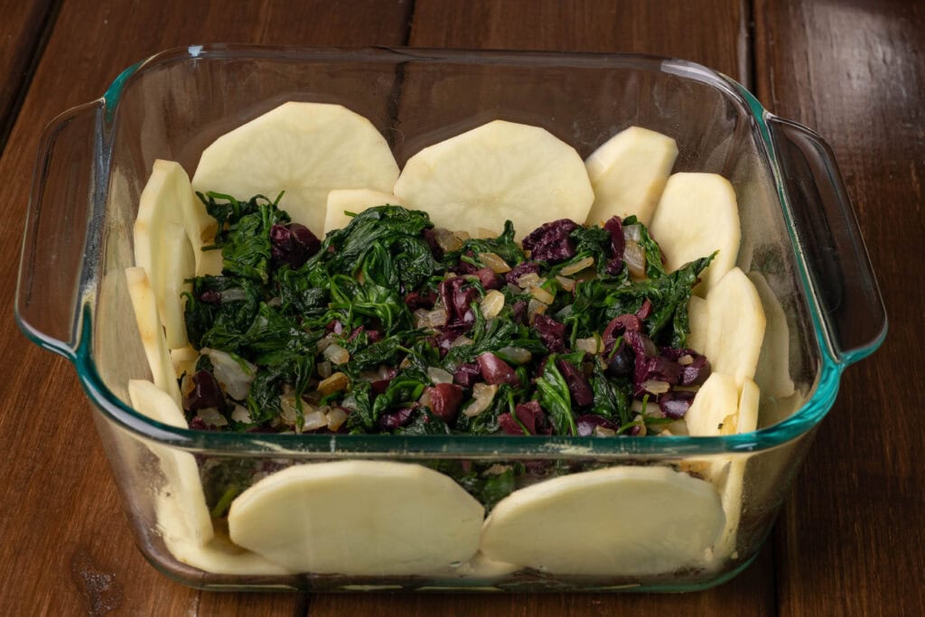 Potato crust with sauteed veggie mixture.