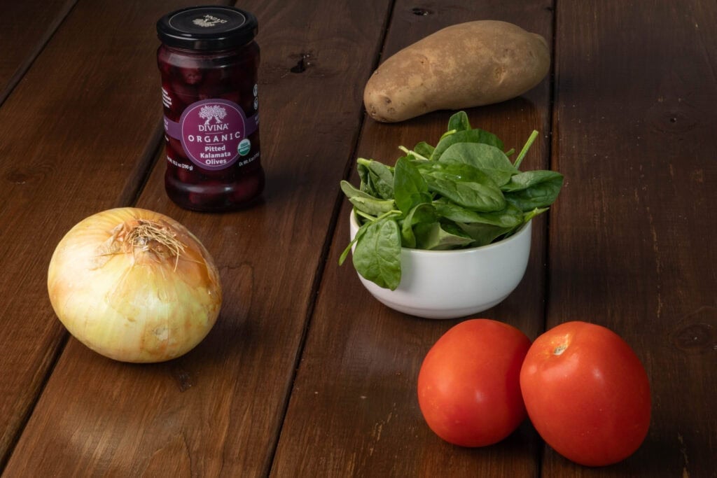 Potato, Kalamata Olives, onion, baby spinach and Roma tomatoes.