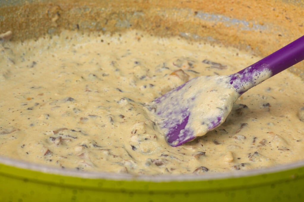 Mushroom gravy in a large pan.