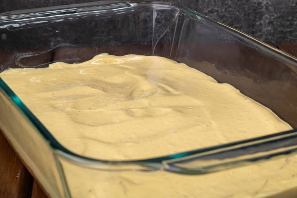 Cheese sauce layer of the taco dip.