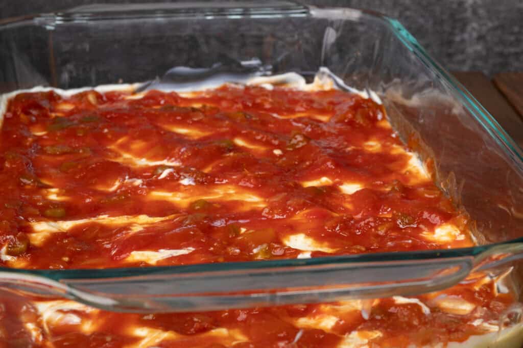 Salsa layer of the taco dip.