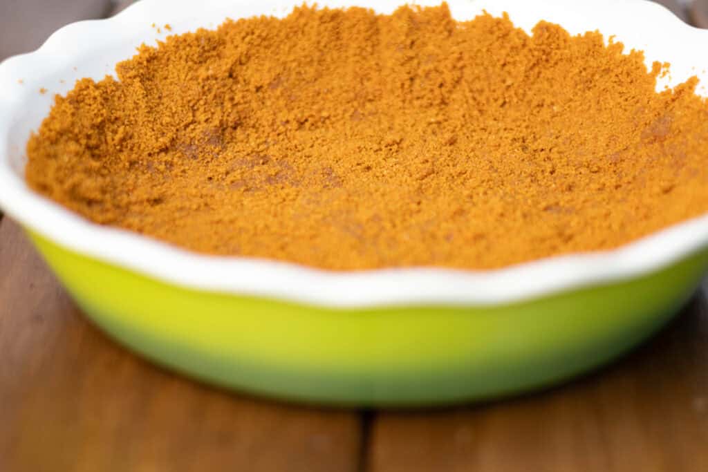 Biscoff crust in a pie pan.