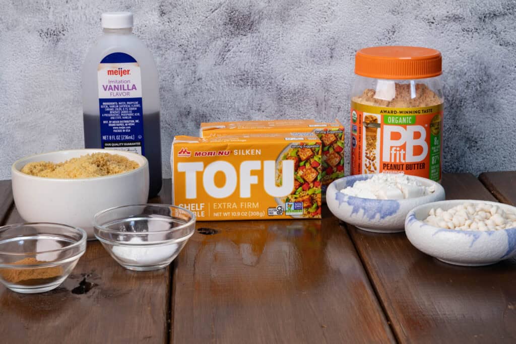 Silken tofu, vanilla, PBFit powdered peanut butter, flour, brown sugar, salt, baking powder, cinnamon and nutmeg.
