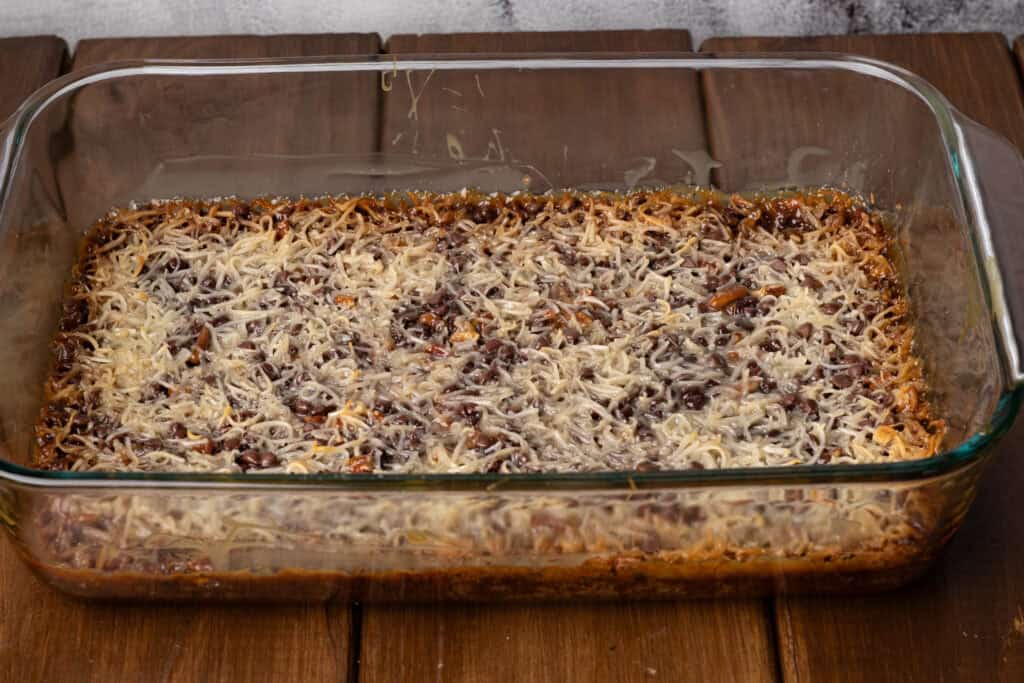 A pan of cooked Hello Dollies.