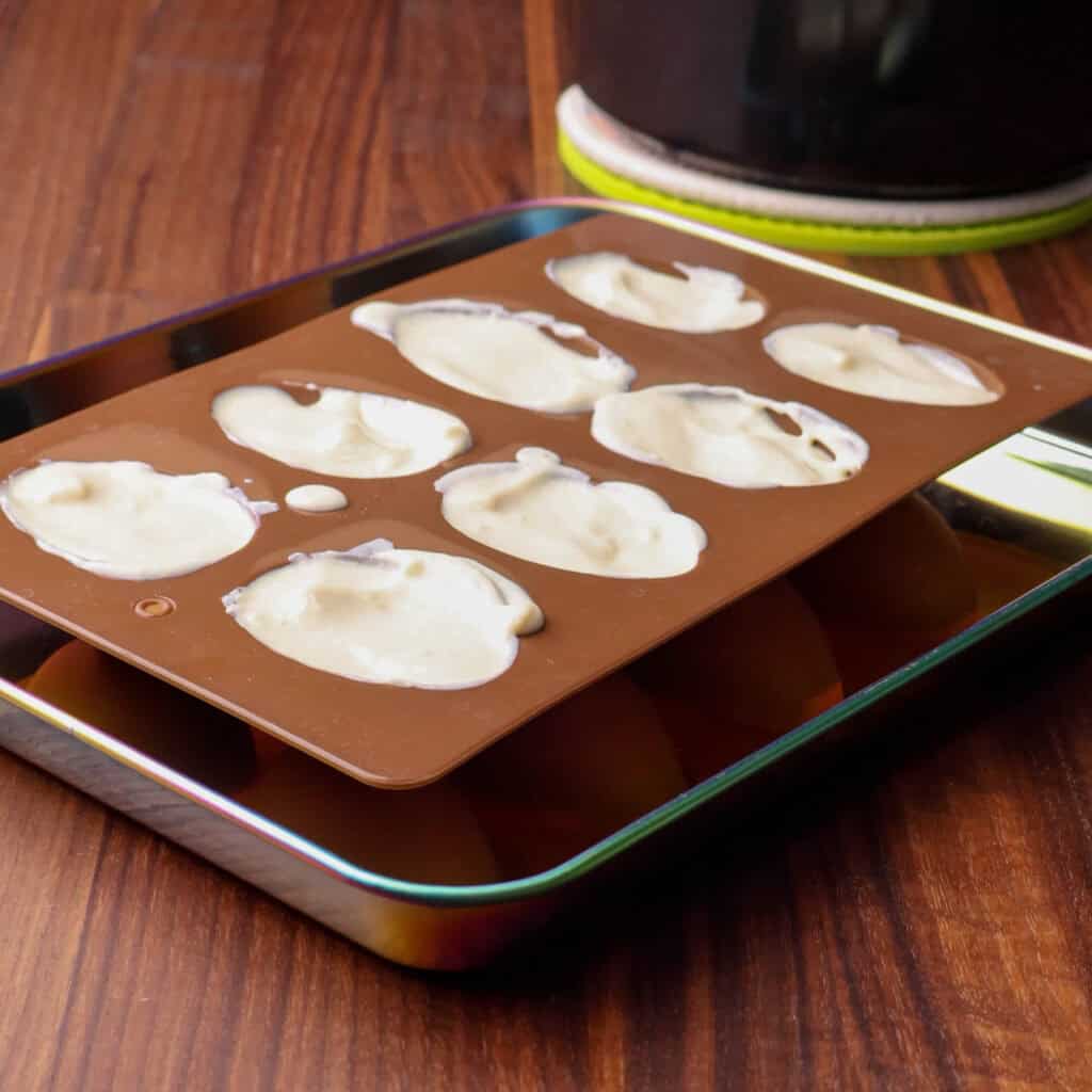 Vegan eggwhites in silicone egg molds.
