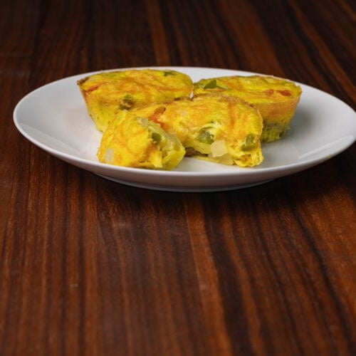 Vegan eggbites on a white plate.