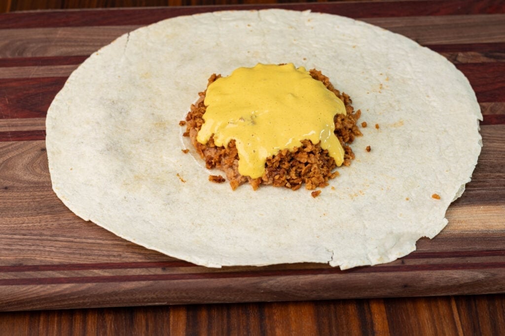 TVP crunchwrap - the nacho cheese layer.